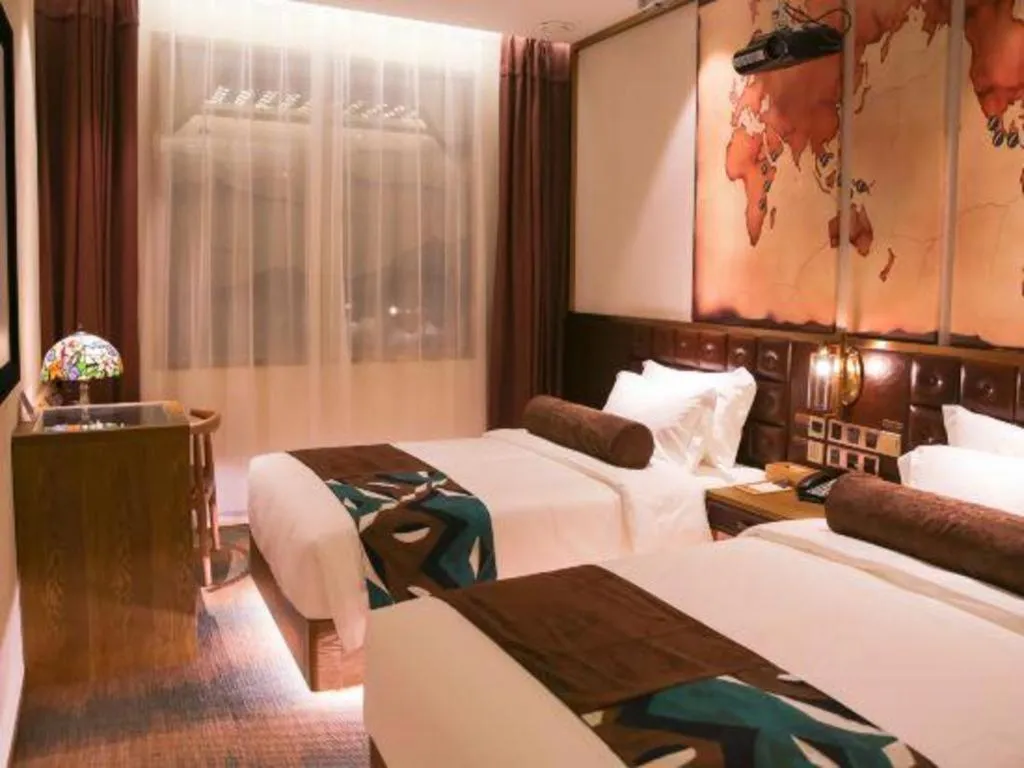 Bed in James Joyce Coffetel Shijiazhuang Wanda Plaza Tangu Metro Station