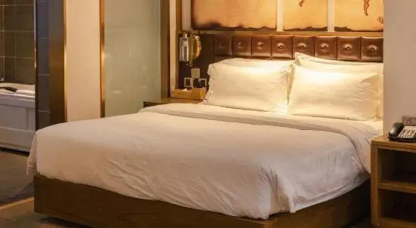 Bed in James Joyce Coffetel Shijiazhuang Wanda Plaza Tangu Metro Station Bed in James Joyce Coffetel Shijiazhuang Wanda Plaza Tangu Metro Station