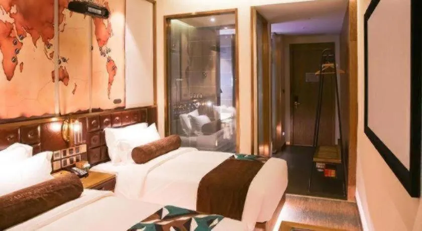 Bed in James Joyce Coffetel Shijiazhuang Wanda Plaza Tangu Metro Station