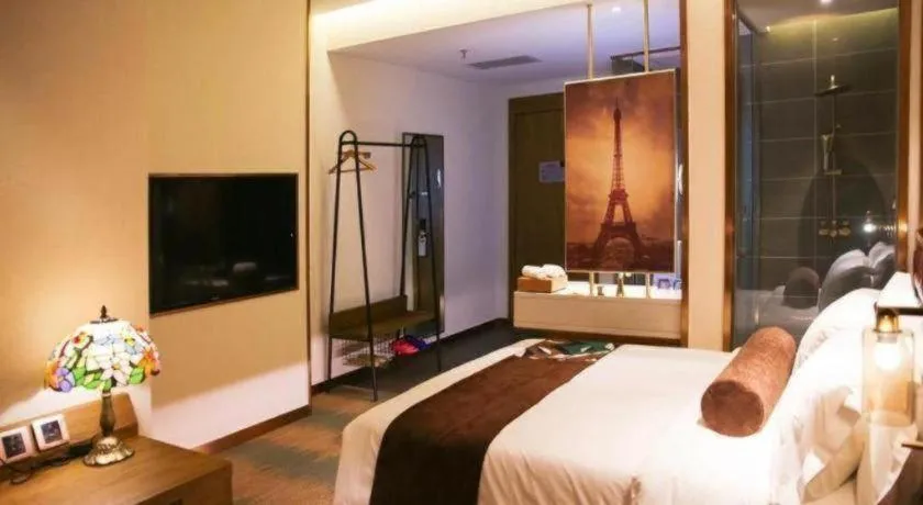 Bed in James Joyce Coffetel Shijiazhuang Wanda Plaza Tangu Metro Station