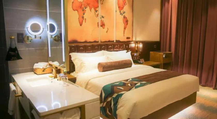 Bed in James Joyce Coffetel Shijiazhuang Wanda Plaza Tangu Metro Station