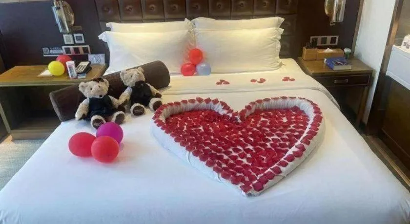 Bed in James Joyce Coffetel Shijiazhuang Wanda Plaza Tangu Metro Station