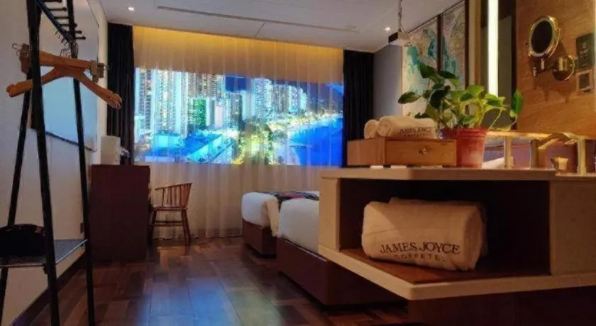 Bed in James Joyce Coffetel Anyang Railway Station Wenfeng Avenue Yinxu Scenic Spot