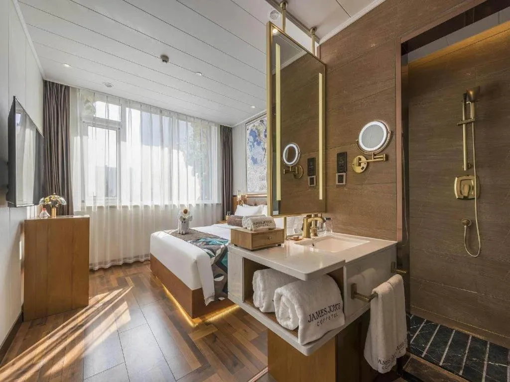 Bed in James Joyce Coffetel Anyang Railway Station Wenfeng Avenue Yinxu Scenic Spot