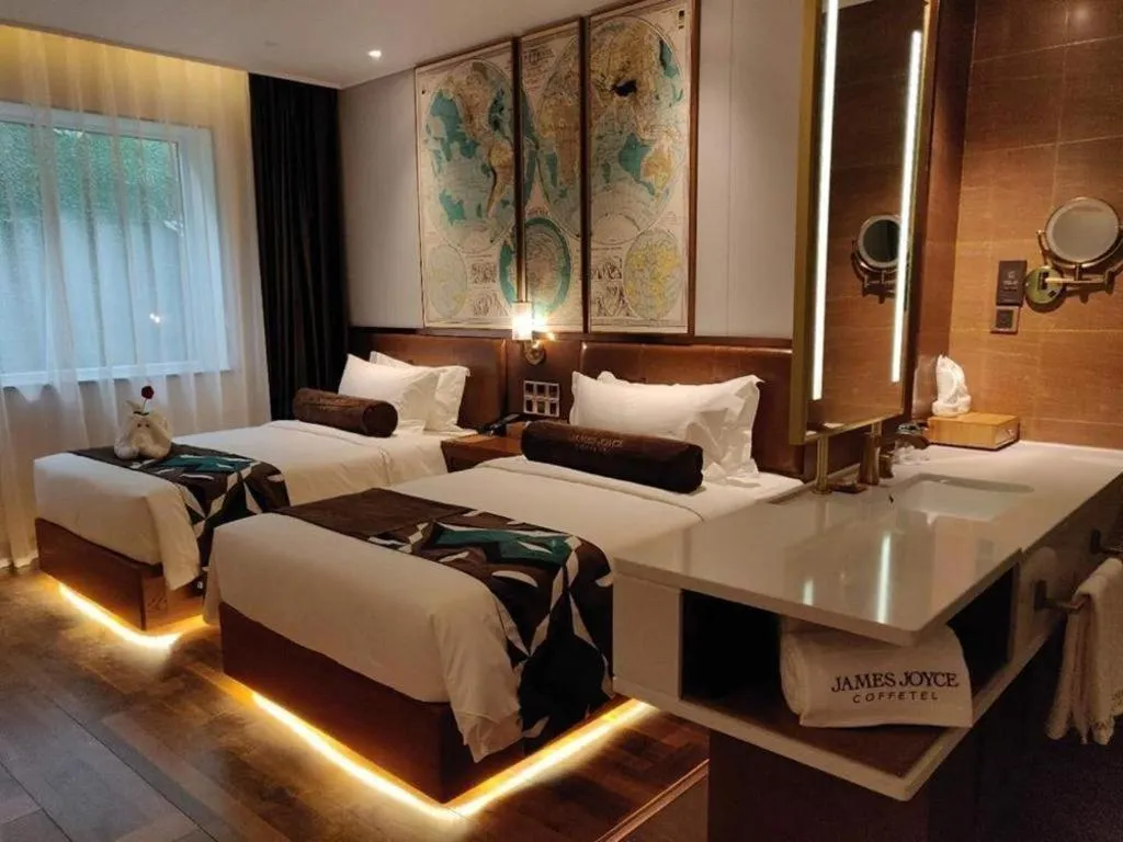 Bed in James Joyce Coffetel Anyang Railway Station Wenfeng Avenue Yinxu Scenic Spot