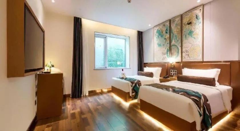 Bed in James Joyce Coffetel Anyang Railway Station Wenfeng Avenue Yinxu Scenic Spot