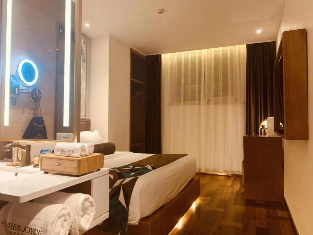 Bed in James Joyce Coffetel Anyang Railway Station Wenfeng Avenue Yinxu Scenic Spot