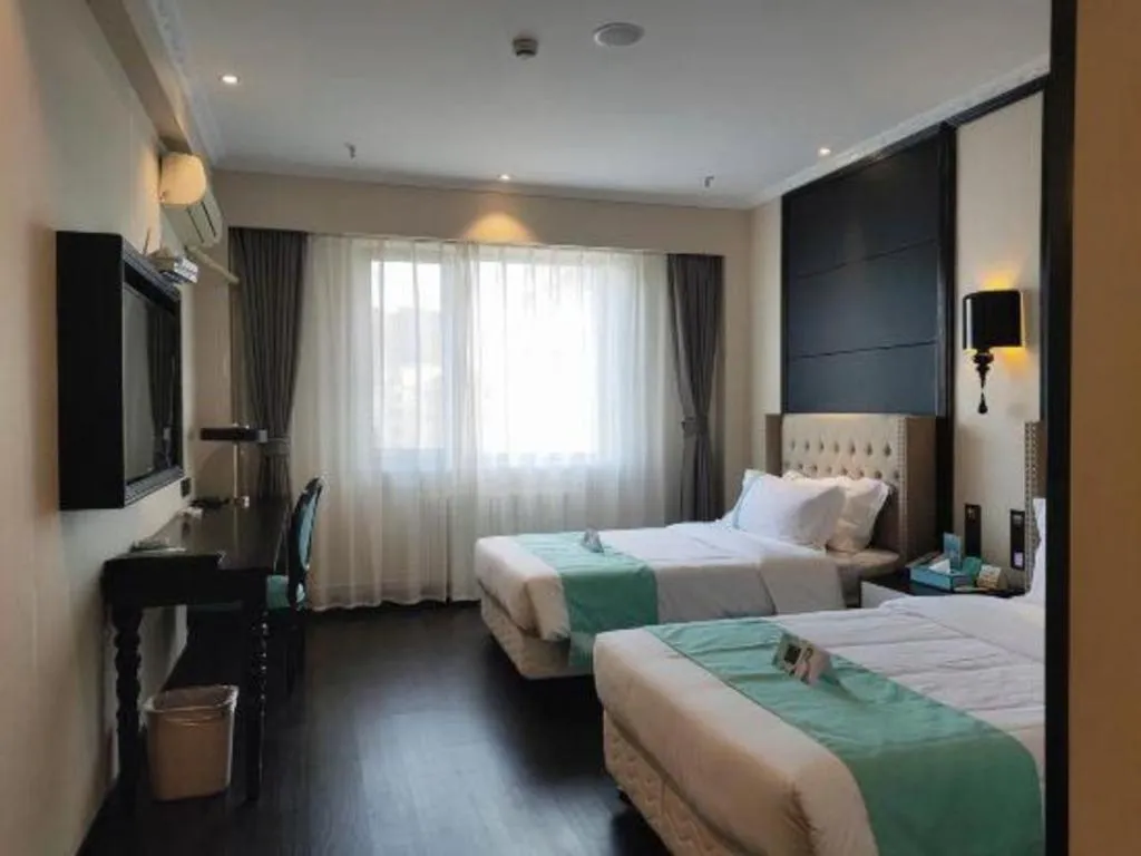 Bed in Xana Hotelle Yining Airport Road Jinwuyuan