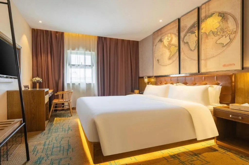 Bed in James Joyce Coffetel Tianjin Railway Station