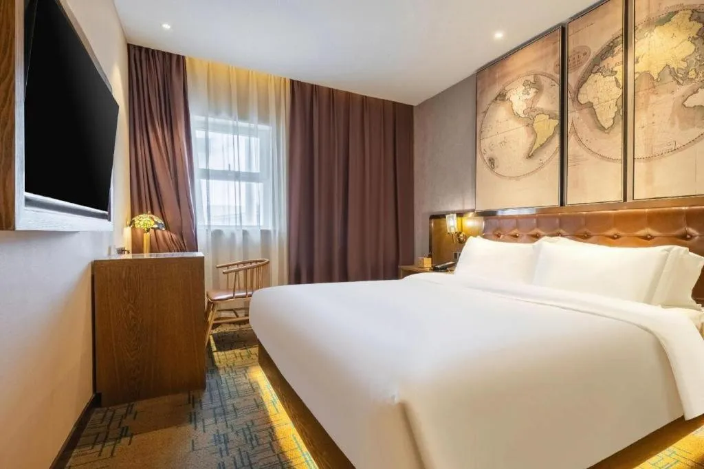 Bed in James Joyce Coffetel Tianjin Railway Station