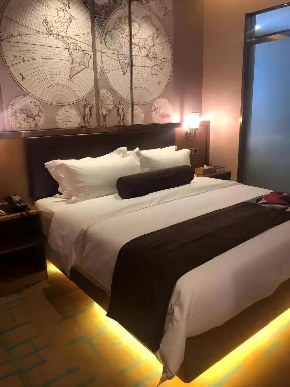 Bed in James Joyce Coffetel Tianjin Railway Station