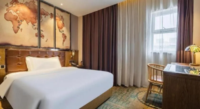 Bed in James Joyce Coffetel Tianjin Railway Station