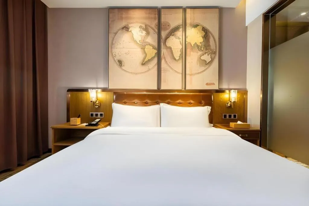 Bed in James Joyce Coffetel Tianjin Railway Station