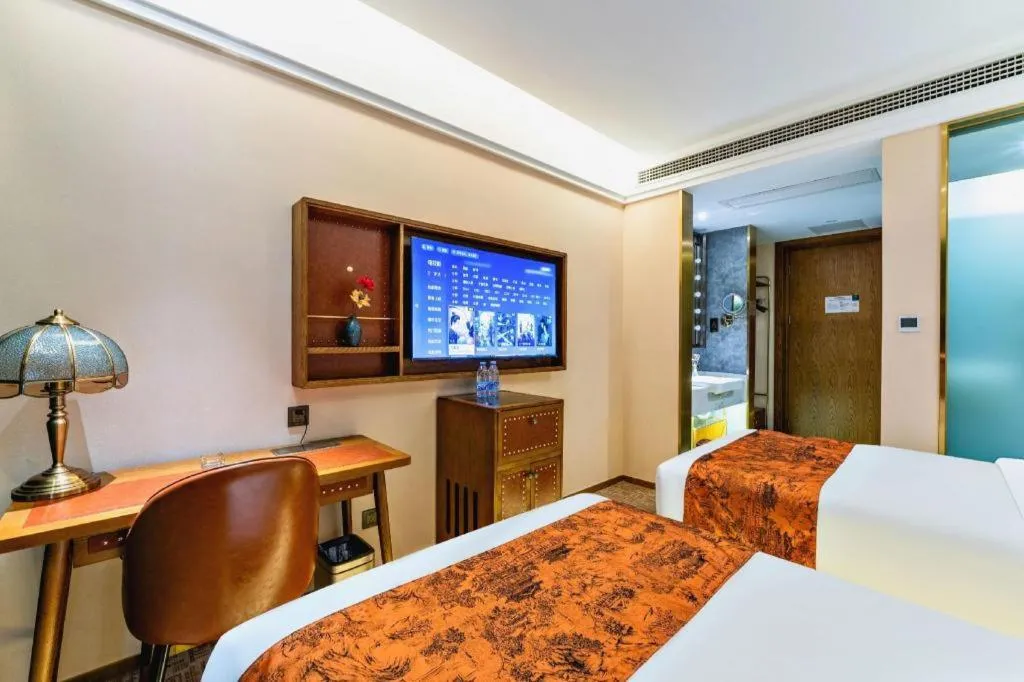 Bed in James Joyce Coffetel Tianjin Railway Station