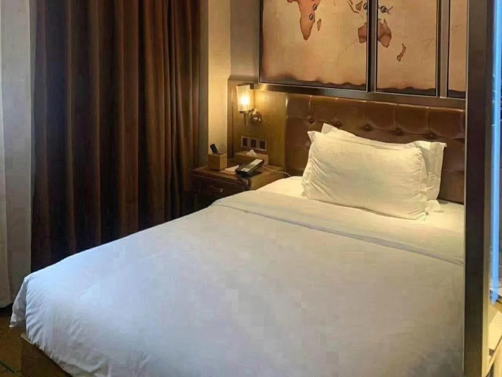 Bed in James Joyce Coffetel Tianjin Railway Station