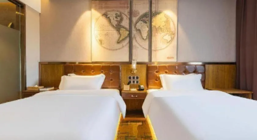 Bed in James Joyce Coffetel Tianjin Railway Station