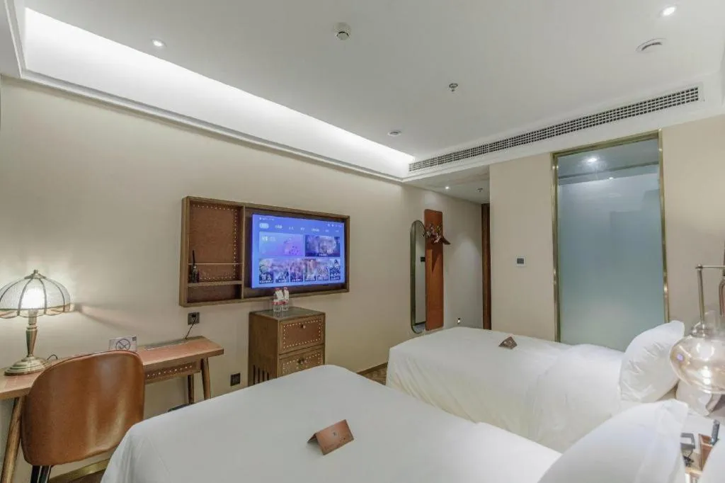 Bed in James Joyce Coffetel Tianjin Railway Station