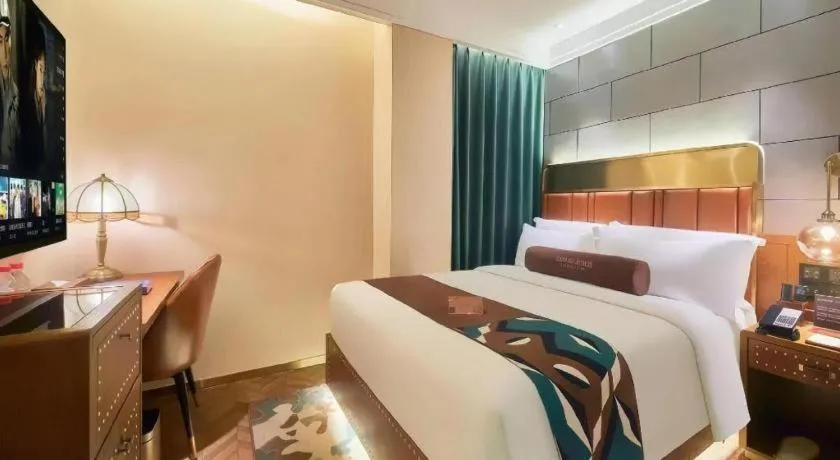 Bed in James Joyce Coffetel Tianjin Railway Station