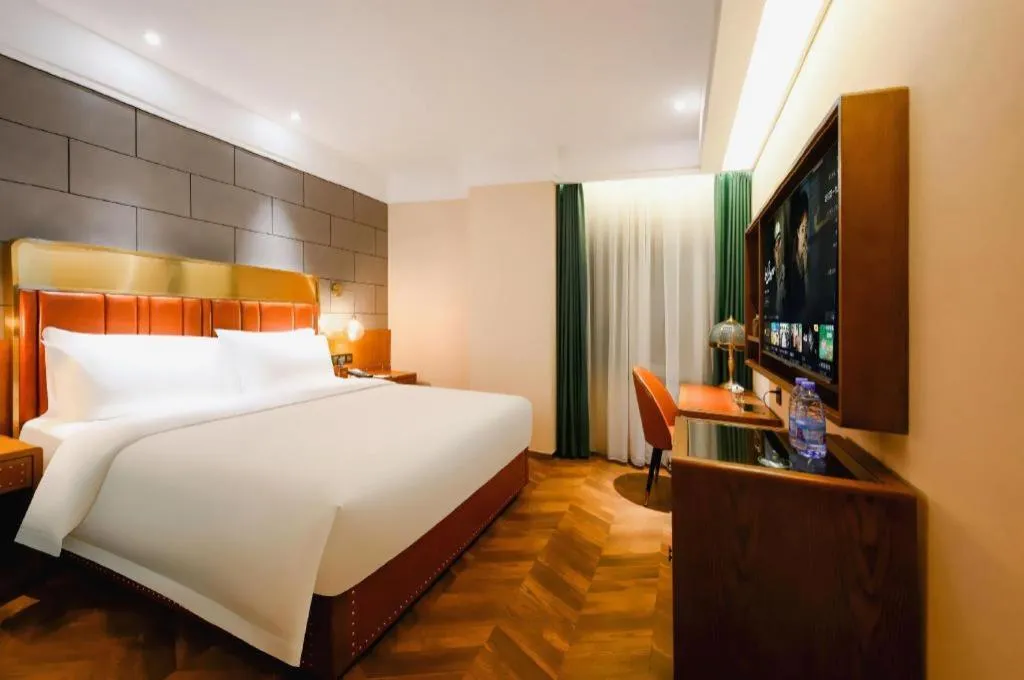 Bed in James Joyce Coffetel Tianjin Railway Station