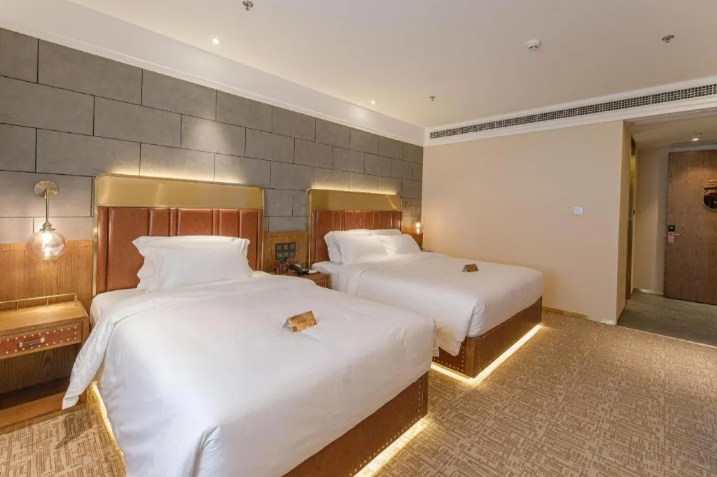 Bed in James Joyce Coffetel Tianjin Railway Station