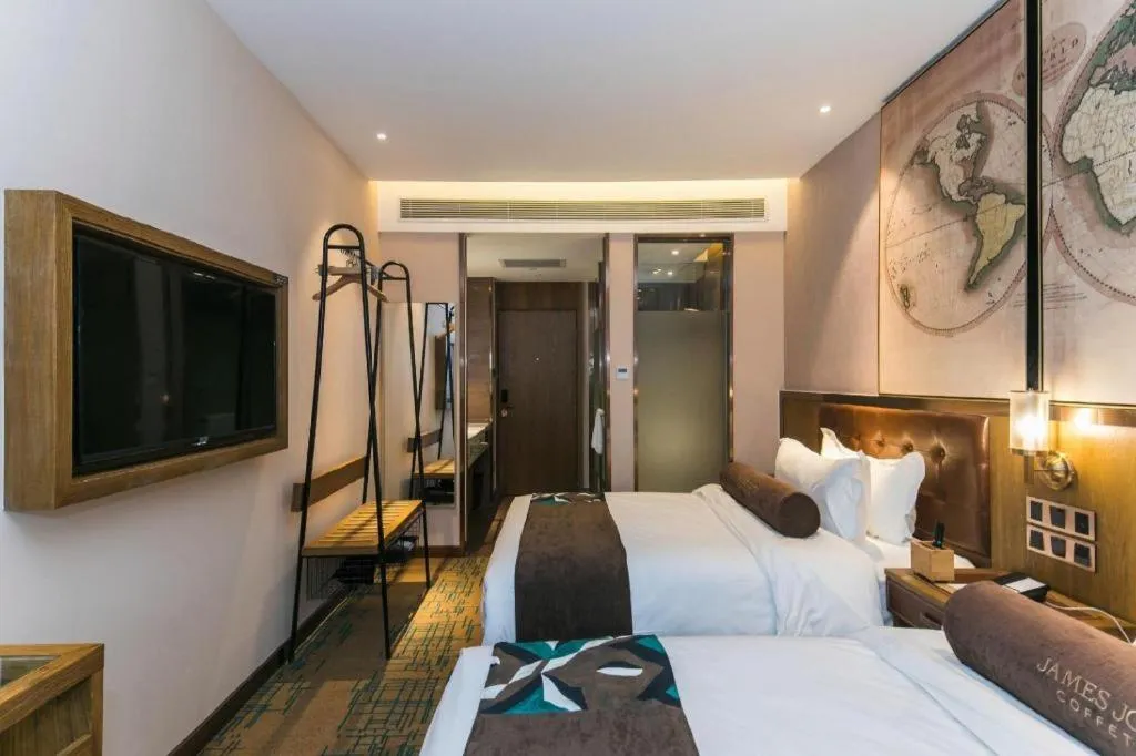 Bed in James Joyce Coffetel Tianjin Railway Station