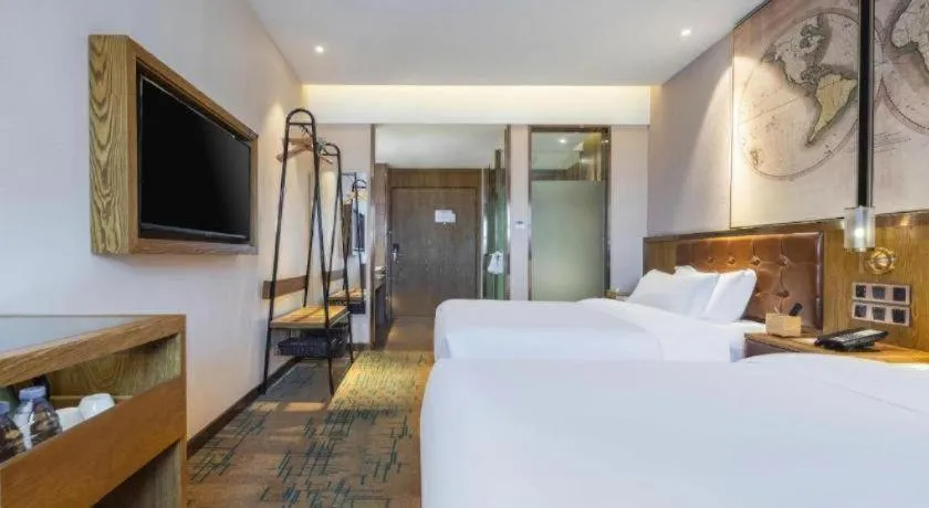 Bed in James Joyce Coffetel Tianjin Railway Station