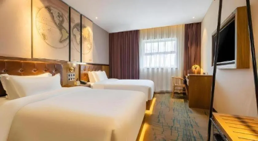 Bed in James Joyce Coffetel Tianjin Railway Station