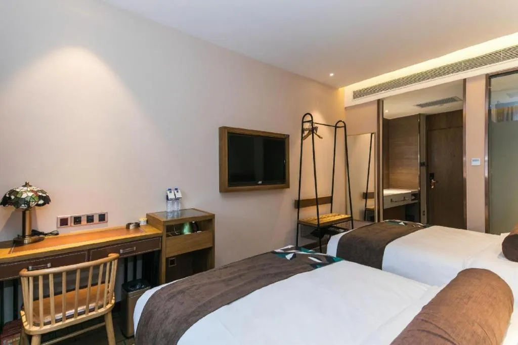 Bed in James Joyce Coffetel Tianjin Railway Station