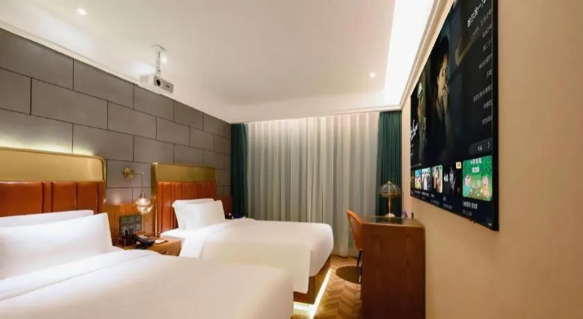 Bed in James Joyce Coffetel Tianjin Railway Station