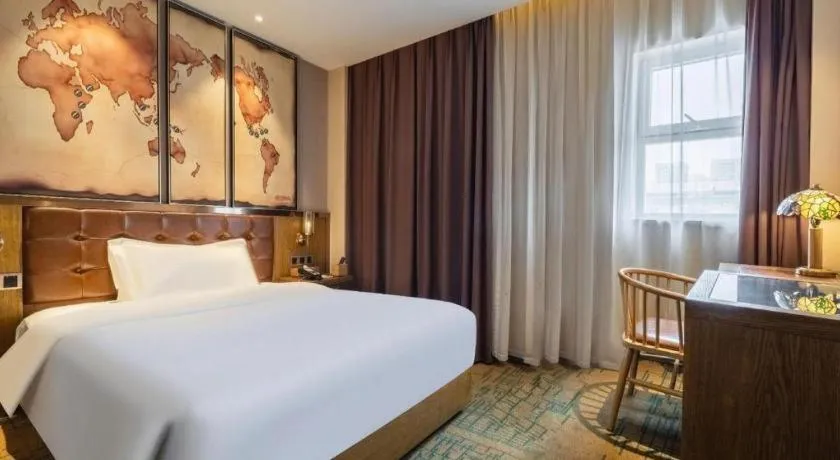 Bed in James Joyce Coffetel Tianjin Railway Station