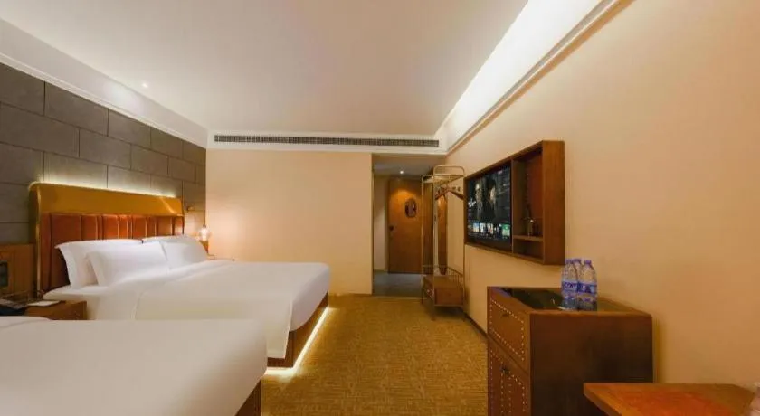 Bed in James Joyce Coffetel Tianjin Railway Station