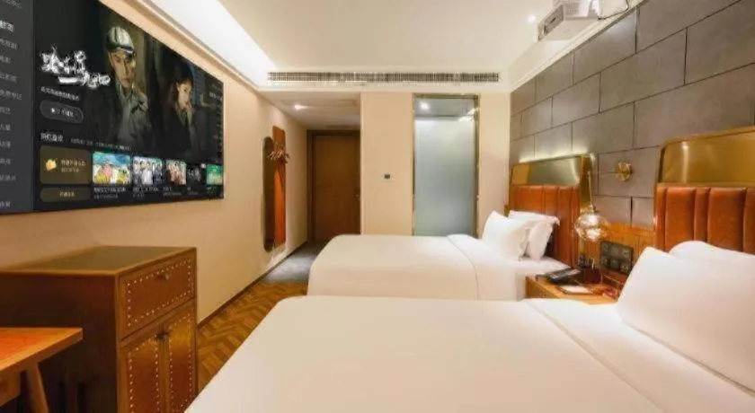 Bed in James Joyce Coffetel Tianjin Railway Station