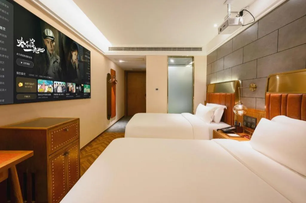 Bed in James Joyce Coffetel Tianjin Railway Station