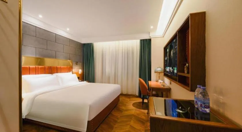 Bed in James Joyce Coffetel Tianjin Railway Station