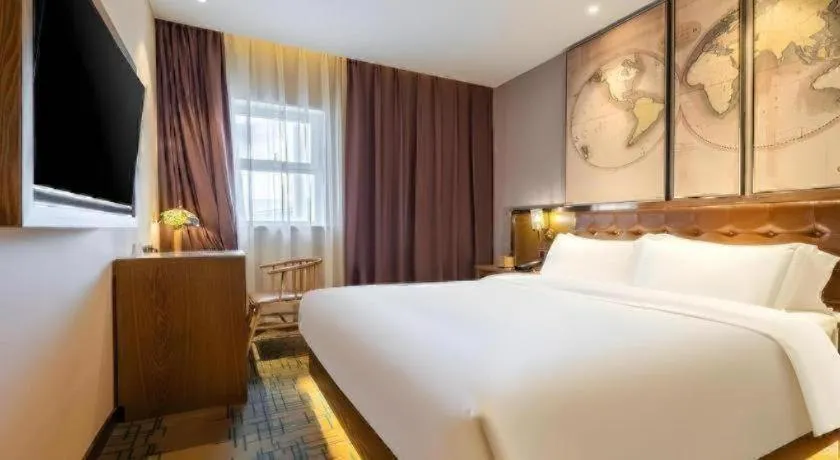 Bed in James Joyce Coffetel Tianjin Railway Station