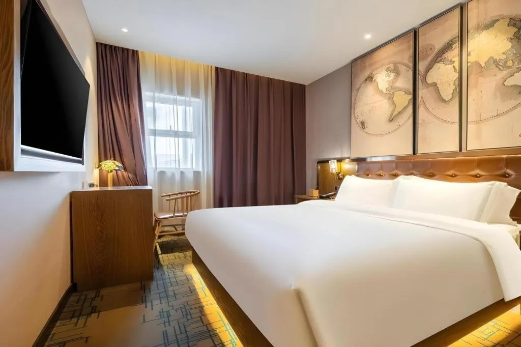 Bed in James Joyce Coffetel Tianjin Railway Station