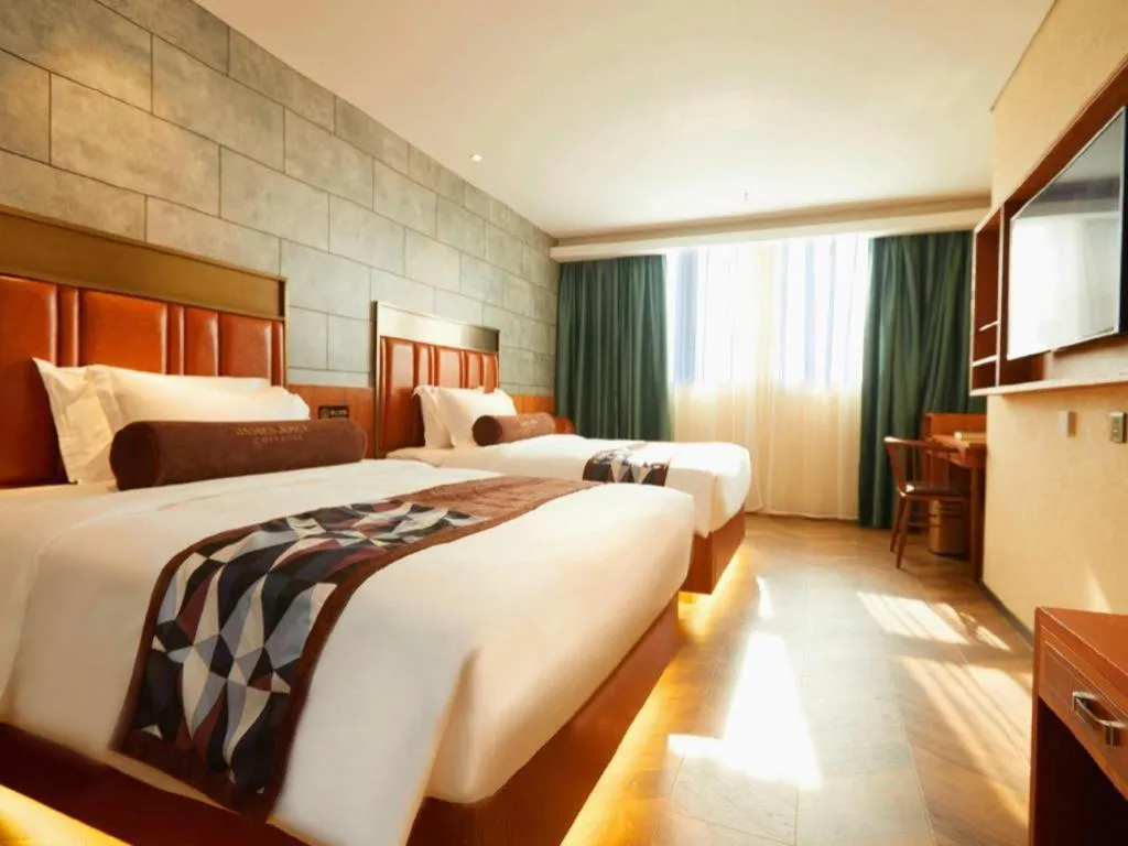 Bed in James Joyce Coffetel Tianjin Railway Station