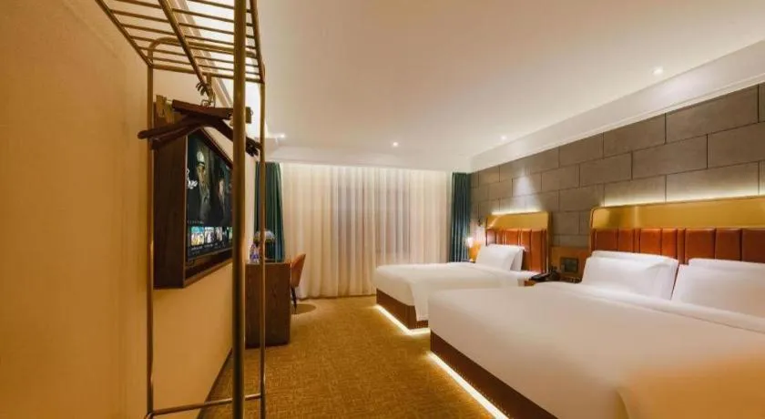 Bed in James Joyce Coffetel Tianjin Railway Station