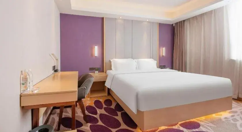 Bed in Lavande Hotels Jinzhong Youjian Pingyao Bed in Lavande Hotels Jinzhong Youjian Pingyao