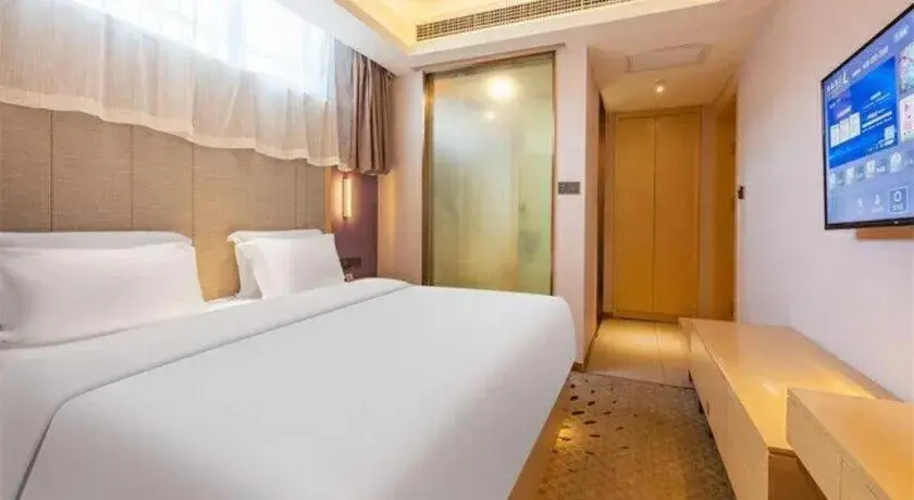 Bed in Lavande Hotels Jinzhong Youjian Pingyao Bed in Lavande Hotels Jinzhong Youjian Pingyao