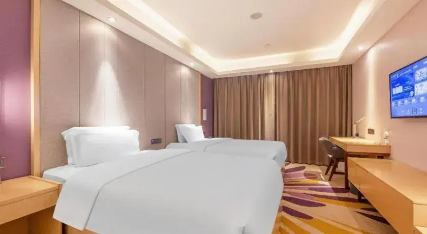 Bed in Lavande Hotels Jinzhong Youjian Pingyao Bed in Lavande Hotels Jinzhong Youjian Pingyao