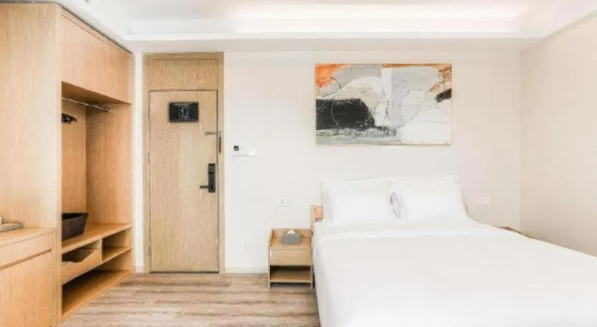 Bed in ZMAX Hotels Wuhan East Lake