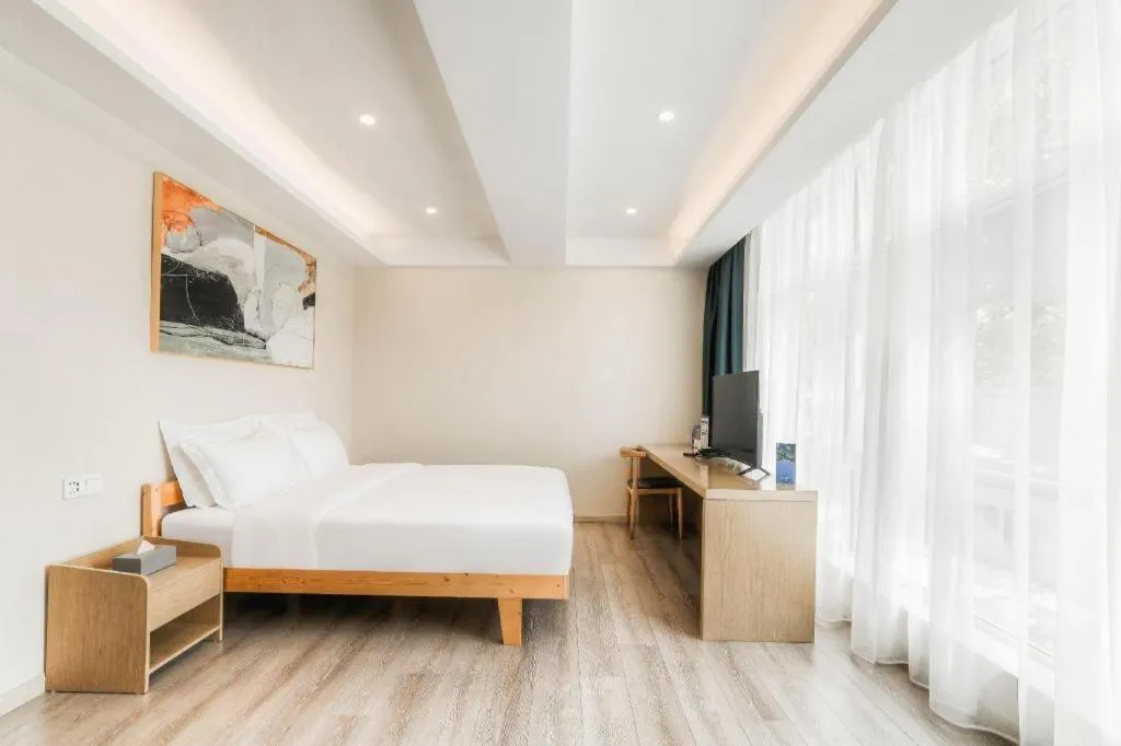 Bed in ZMAX Hotels Wuhan East Lake