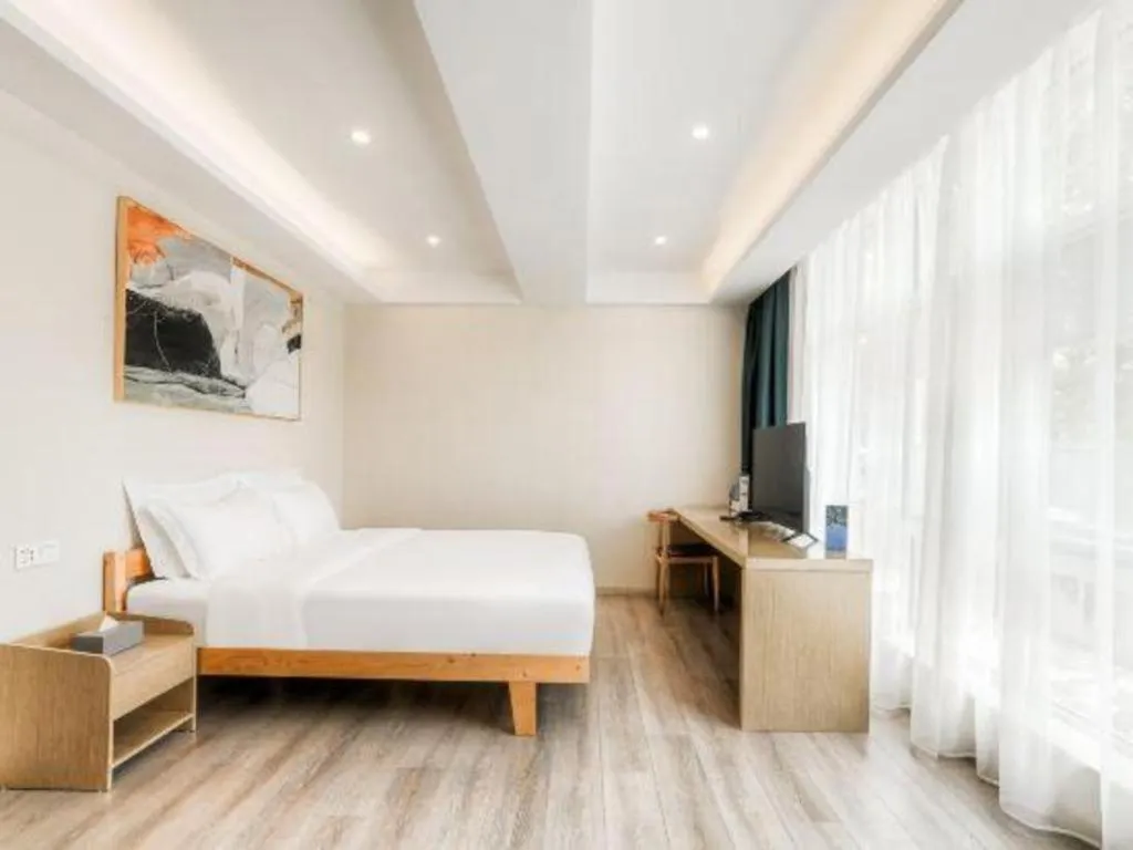 Bed in ZMAX Hotels Wuhan East Lake