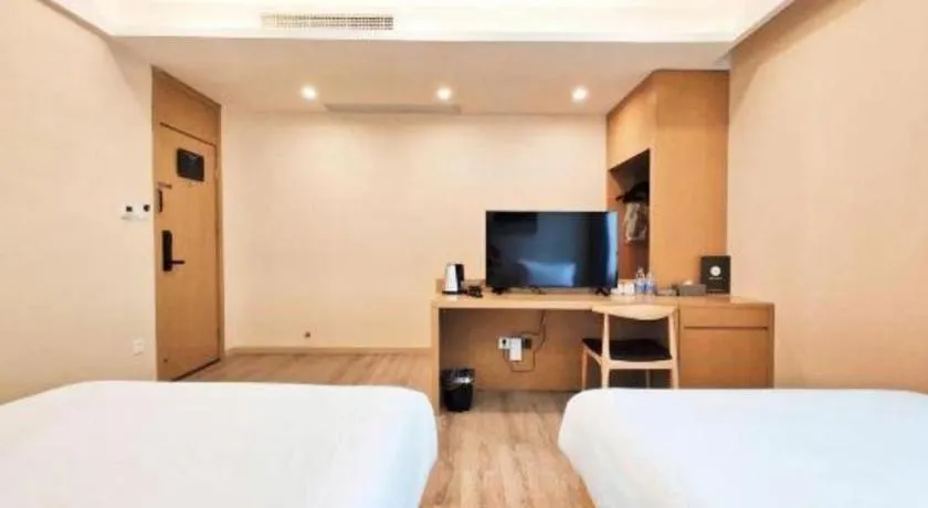 Bed in ZMAX Hotels Wuhan East Lake