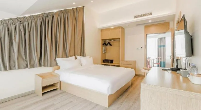 Bed in ZMAX Hotels Wuhan East Lake