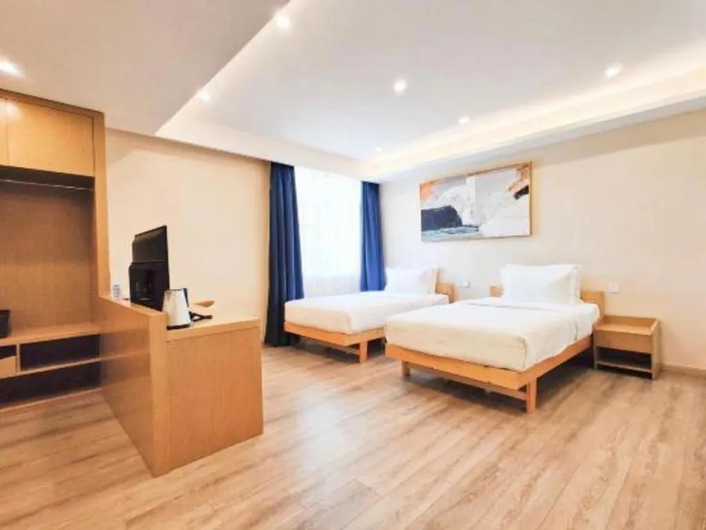 Bed in ZMAX Hotels Wuhan East Lake