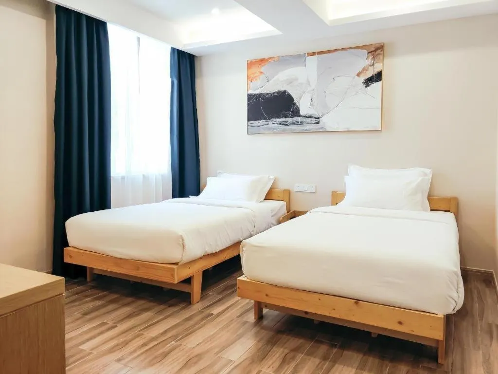 Bed in ZMAX Hotels Wuhan East Lake