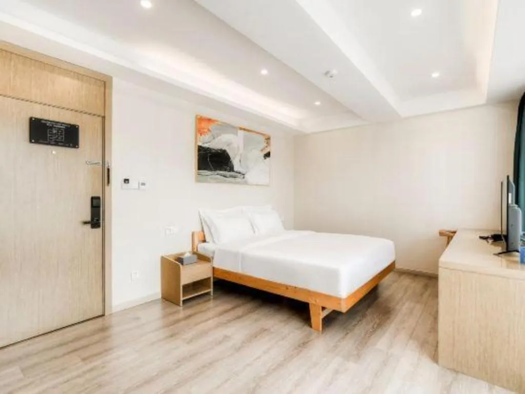 Bed in ZMAX Hotels Wuhan East Lake