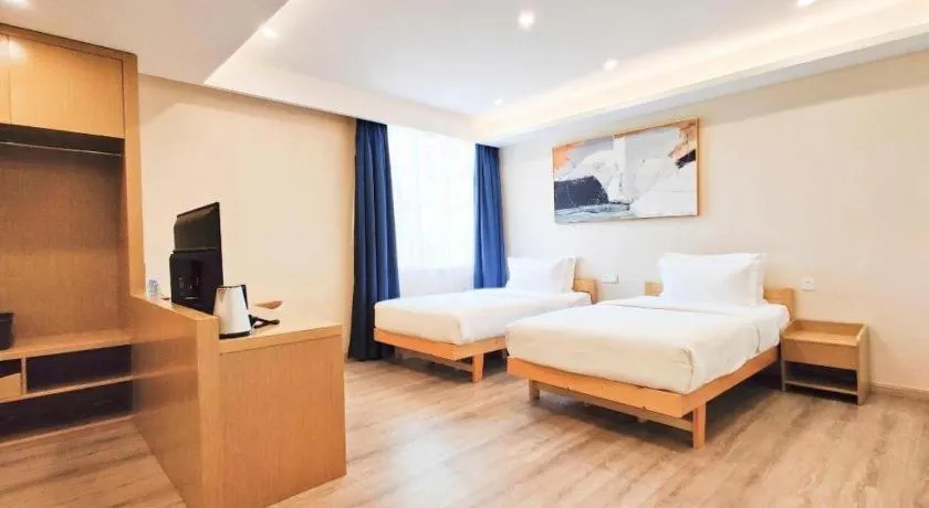 Bed in ZMAX Hotels Wuhan East Lake